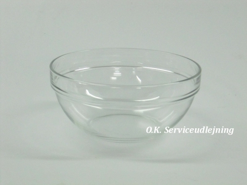 Eight shirts arranged on table in black, olive, grey, blue, white, red, mustard, and green.